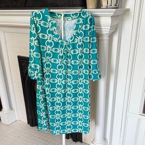 Aryeh “In Chsins” bell sleeve dress in teal and cream. Worn about 3times